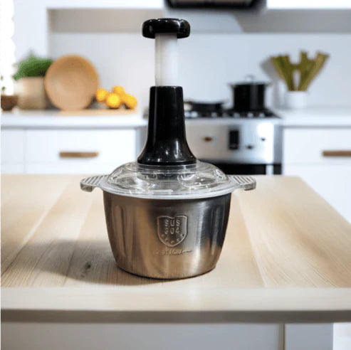 Manual Stainless Steel Hand Push Chopper with 4 sharp blades for quick chopping of vegetables, meat, fruits, and herbs. Durable, easy to use, and no electricity needed.